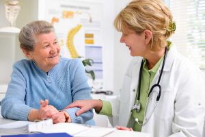 Doctor meeting with senior woman about skilled nursing care