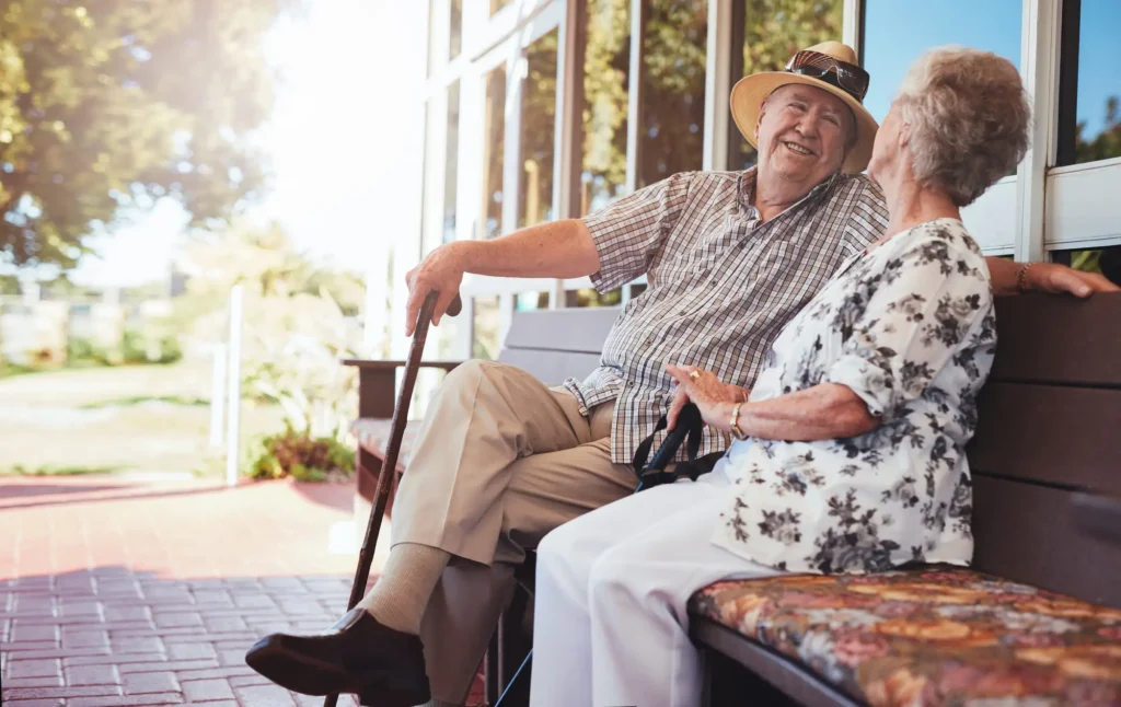 senior couple outside home