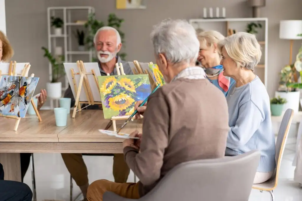 An art painting class for seniors being held at Rolling Green Village in Greenville, SC.